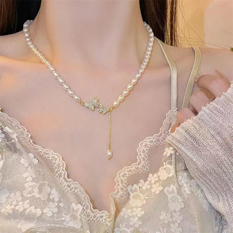 流苏蝴蝶项链女轻奢气质满钻锆石锁骨链钛钢仿珍珠吊坠choker夏季
